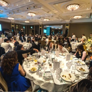 Guests enjoying a Goodwill Caravan gala dinner